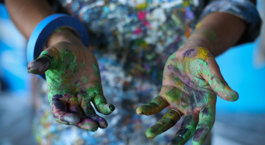 Paint covered hands